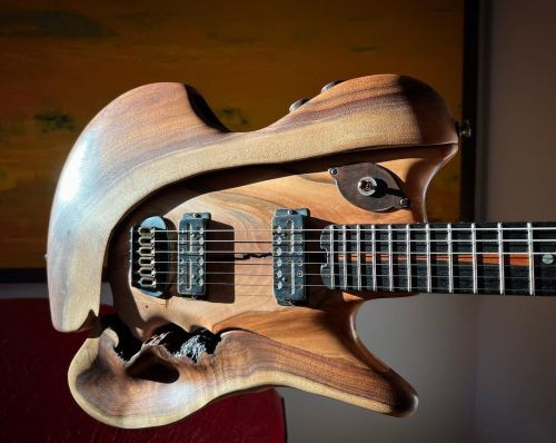 I’m finishing up the latest M-tone guitar. Walnut wraps a maple interior. All local wood from @windw