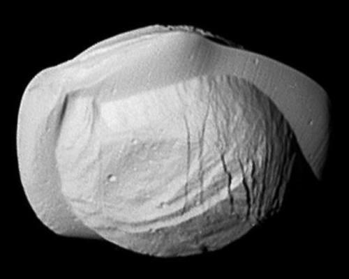 antikythera-astronomy:Pan, Saturn’s “Ravioli” Moon(Image credit: NASA/JPL-Caltech/Space Science Inst