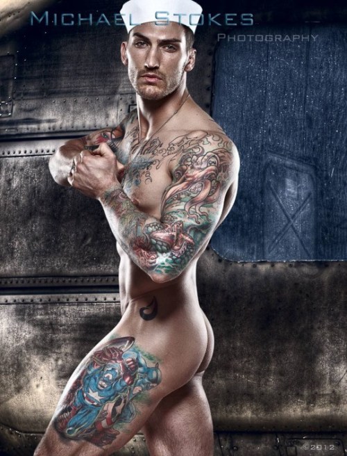 dominicanblackboy:  Sexy gorgeous hot tatted muscle ass Adam Von Rochfelder naked while the picture moves! 
