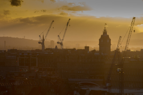 The sun setting behind the Balmoral Hotel.