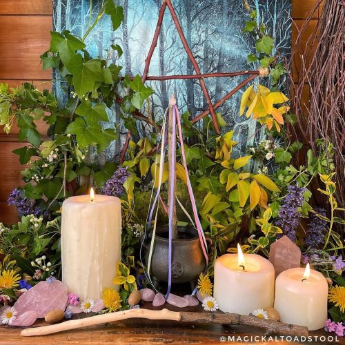 Beltane altar 2022 As always, foraged or home grown foliage. I also finally finished my hawthorn wan