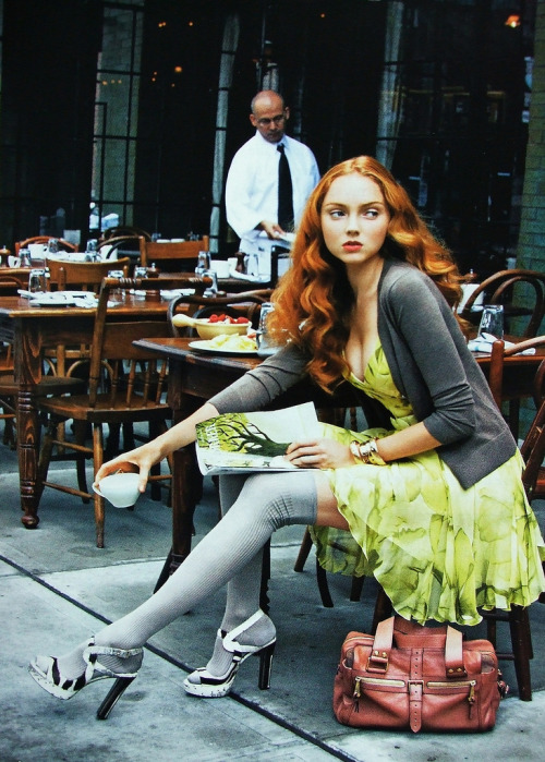 books0977:  Lily Cole reading The New Yorker. “New York Doll.” Photo by Arthur Elgort for British Vogue, January 2008. “For lunch at the Gemma Café, school knits add studious charm to Versace’s chiffon ensemble. Belted silk-chiffon dress,