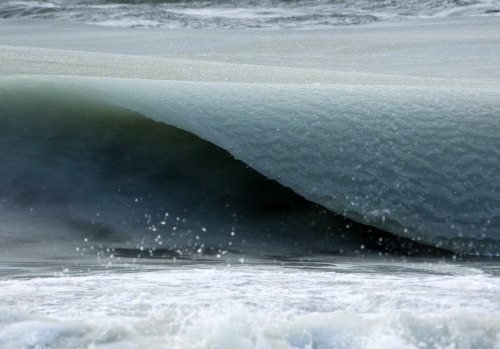 asylum-art: Jonathan Nimerfroh: Semi-frozen waves roll ashore in New EnglandPlummeting temperatures 