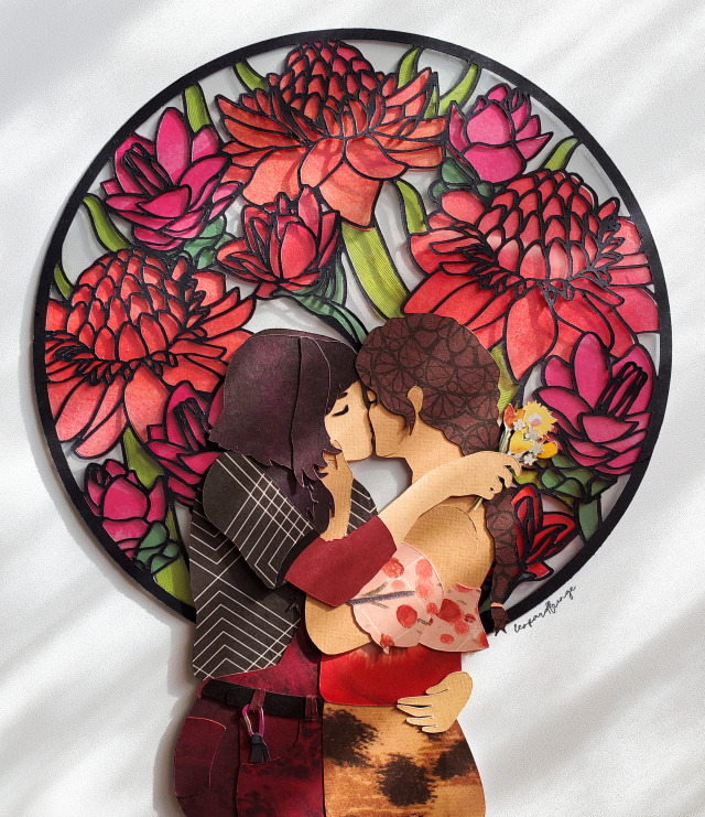 chitsangenthusiast:[id: a layered papercraft showing mai and ty lee seconds before sharing a kiss. ty lee cradles mai’s jaw in her hand as she leans in, and mai has one arm wrapped around her waist to pull her in close. her other arm rests over