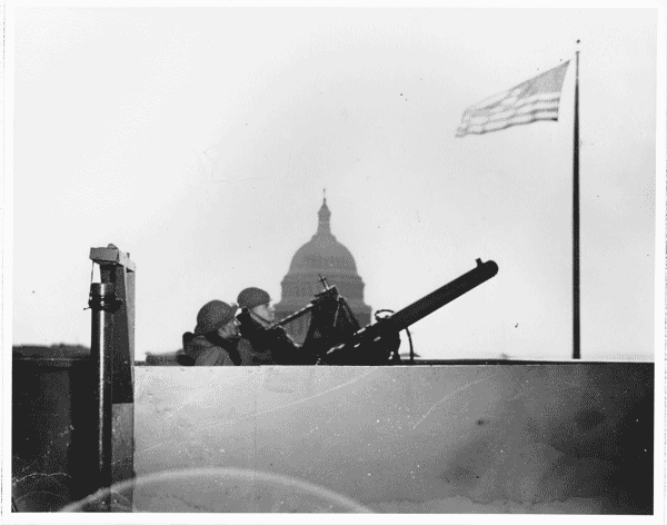 Soldiers on the roof of a building near the Capitol with an anti-aircraft weapon, 1942, FDR Library,