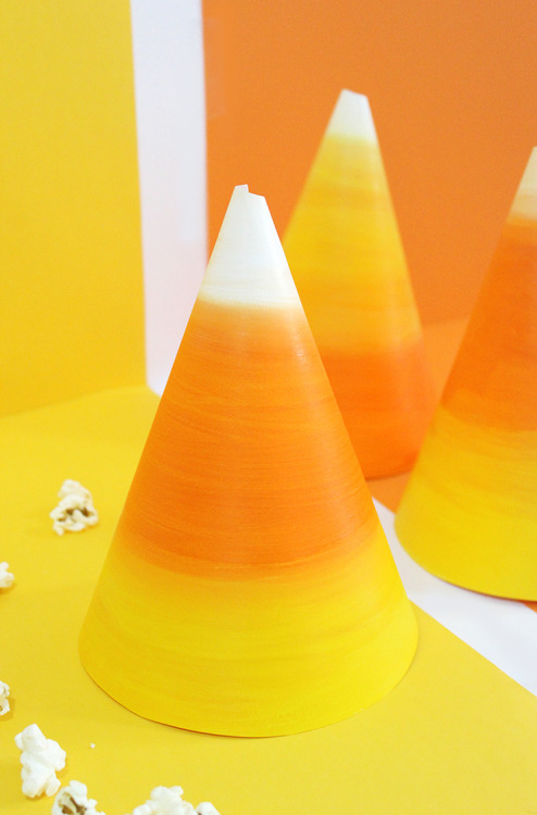 thecraftables:DIY Candy Corn Popcorn Holders!Last week, we worked on some DIY Halloween Games and th