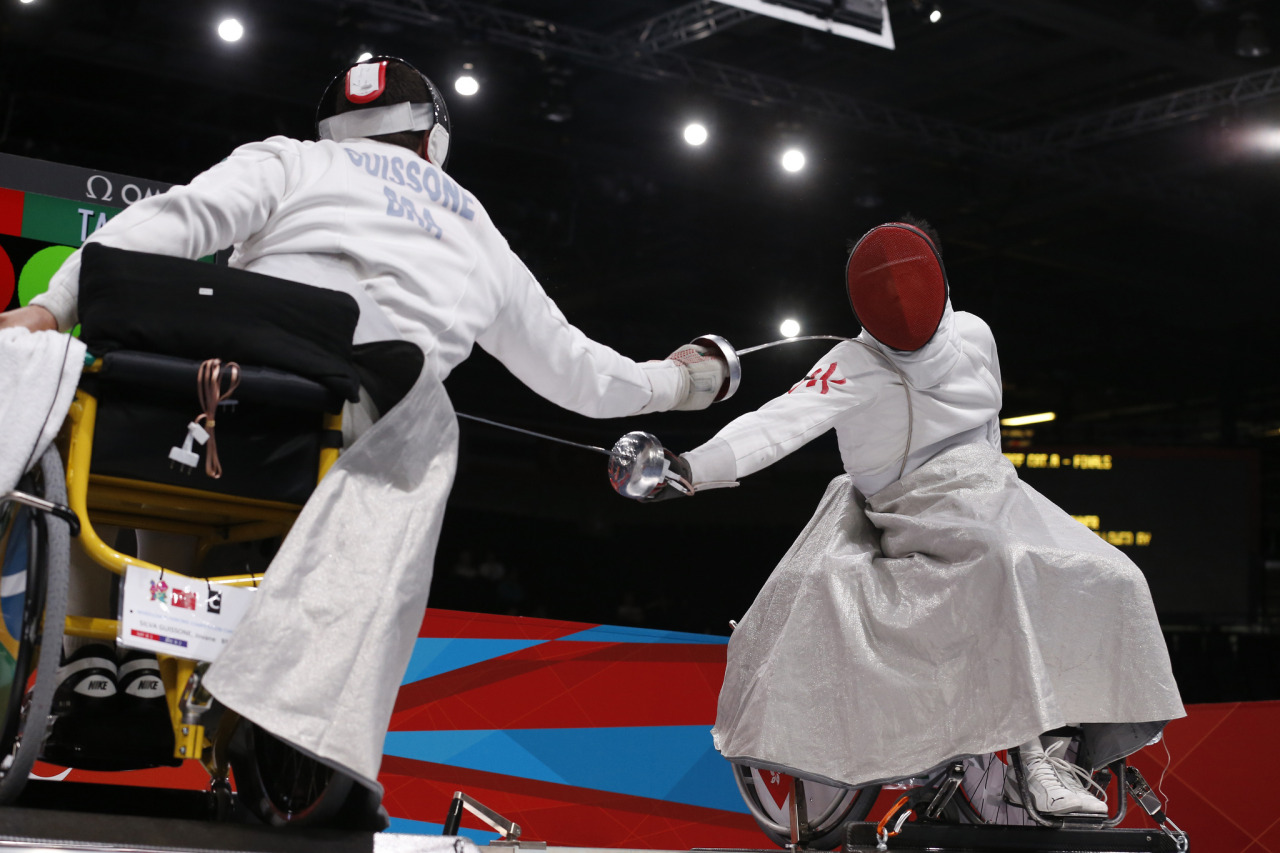 modernfencing:[ID: two photos of a wheelchair epee bout.] Jovane Guissone Silva (left)