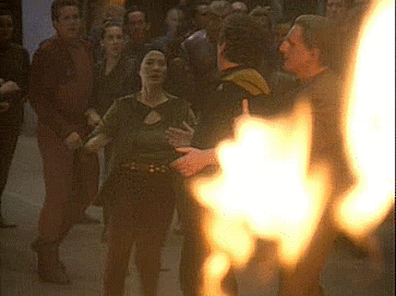 startrekhugs:[Image: Keiko rushes to hug Miles in front of the burning schoolroom. From In the Hands