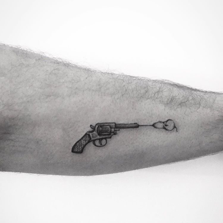 25 of the Best Gun Tattoos  Tattoo Insider