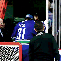 hamhoose-blog:Eddie Lack gives a kid his hockey stick after the last game of the season.