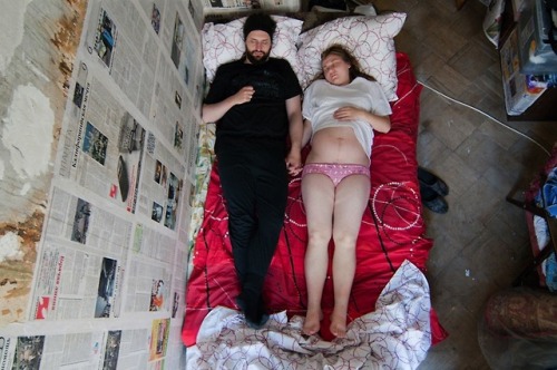  Jana Romanova a Russian photographer captures couples in their sleep to explore their cultural attitude inside their families. Since she didn’t want them to pose she had to stick around their house till they fall asleep deeply and she would take the