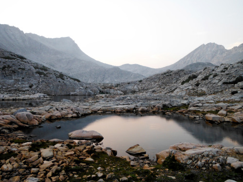 The smoke adds a surreal, muted light to the landscape. Pinnacles Lakes Basin, John Muir Wilderness,