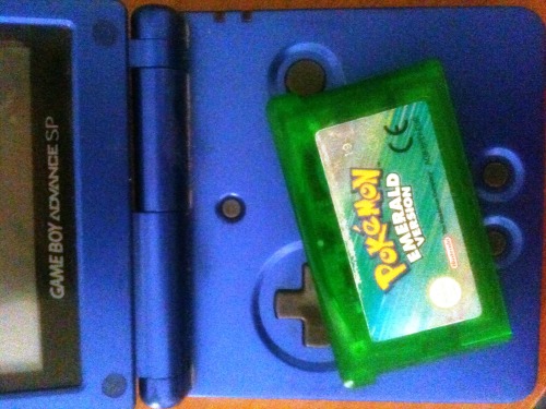 my GBA SP and the Pokémon EMERALD version :3 known as the sister game to Ruby and Sapphire and have 