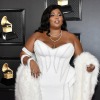 Sex coutureicons:lizzo wearing versace at the pictures