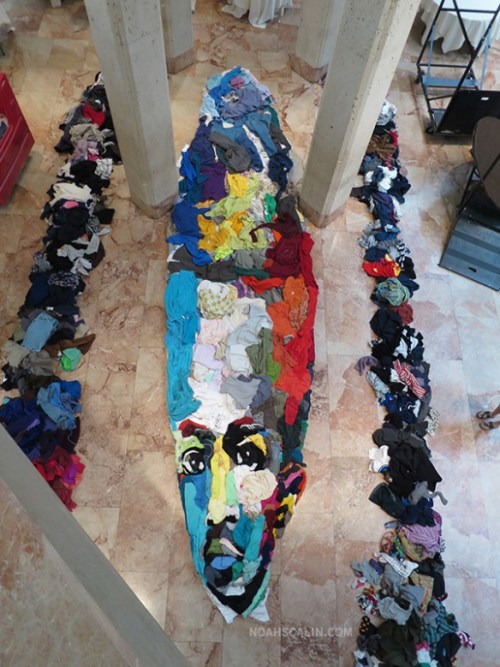 hifructosemag:From certain angles, works by Noah Scalin can just look like piles and piles of clothes strewn along the floor. But at the right angle, absorbing portraits come into focus. See more on HiFructose.com.