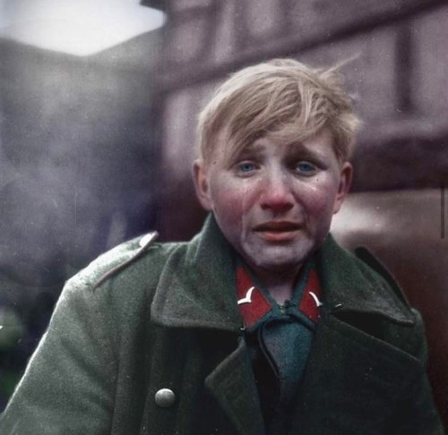 nomoretimetodie: 16 year-old anti-aircraft soldier of the Hitler Youth, Hans-Georg Henke, cries from