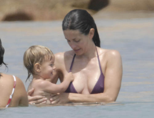 toplessbeachcelebs:  Courtney Cox (Actress) bikini nipple slip in Sardinia, Italy (June 2006)