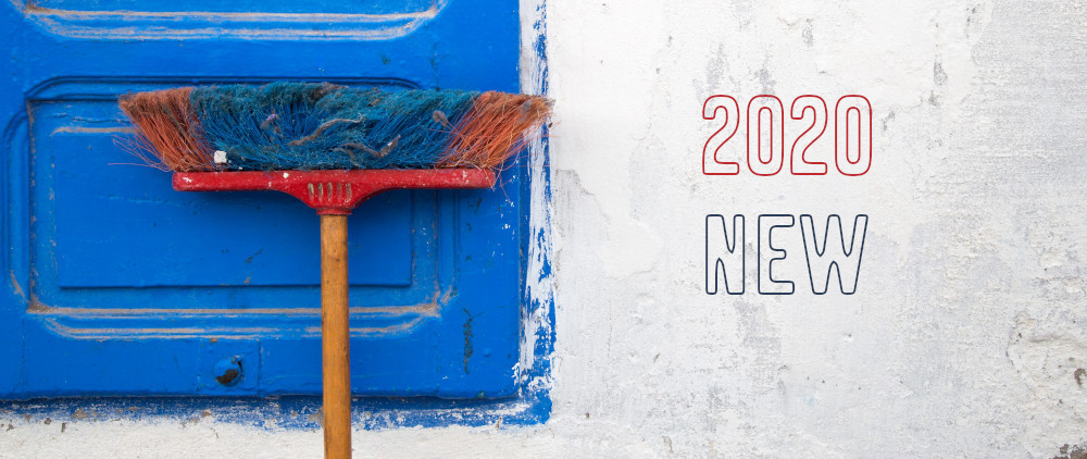broom leaning on wall