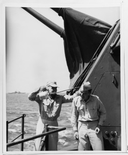 lex-for-lexington:    “Admiral William F. Halsey , Commander Third Fleet, pretends to give Commander C. Weeks (Medical Corps) an “oiling up” with an oil can he received as a Christmas present from his staff aboard USS New Jersey (BB-62) en route