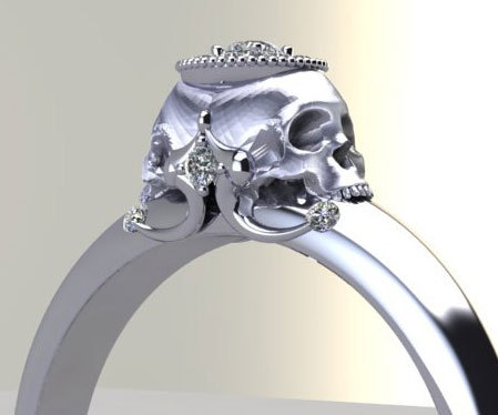 awesomeshityoucanbuy:  Diamond Skull Engagement RingsRemind your beloved that marriage is until the bitter end with this stunning diamond skull engagement ring. This elegantly morbid piece of jewelry features a double sided skull holding up a crown halo