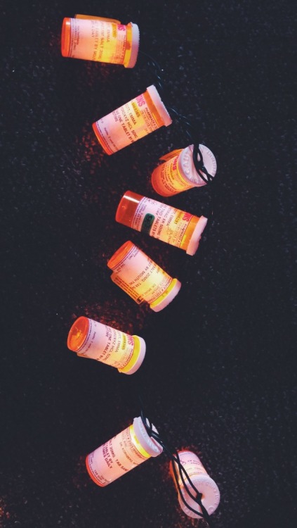 transitory296-50:Re-fashioning my empty prescription bottles into pretty mood lighting. 