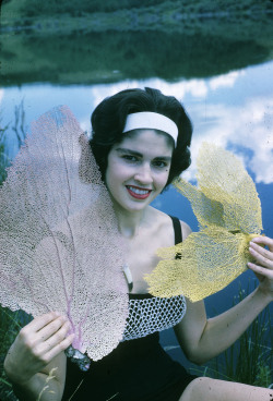 yesterdaysprint:   Scuba diver Heather McEwen with coral fans from the Bahamas, Alberta, 1962