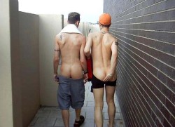 otkdude:  Making that long walk to the coach’s office where a paddling awaits. The coach always requires his players to have their shorts down and bare asses ready for punishment. 