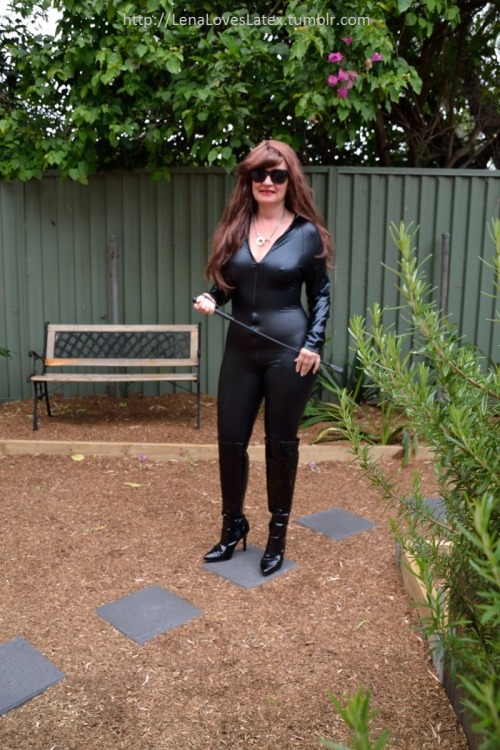 lenaloveslatex:Lena enjoying spring in the garden. Should i get the leash, Mistress? Is is time for 