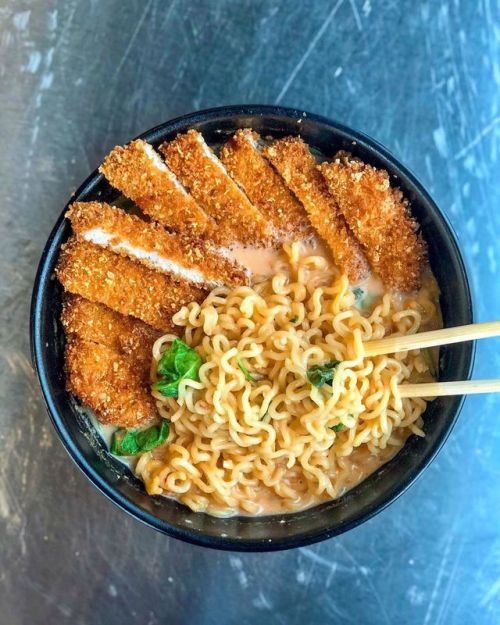 everybody-loves-to-eat - spicy ramen topped with pork...