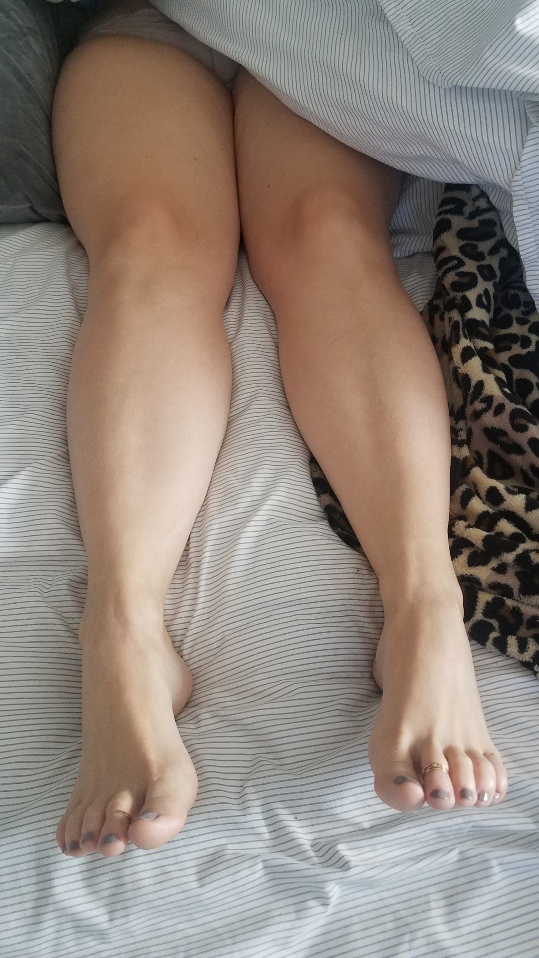 myprettywifesfeet:My pretty wifes beautiful legs and feet asleep in bed this morning.please