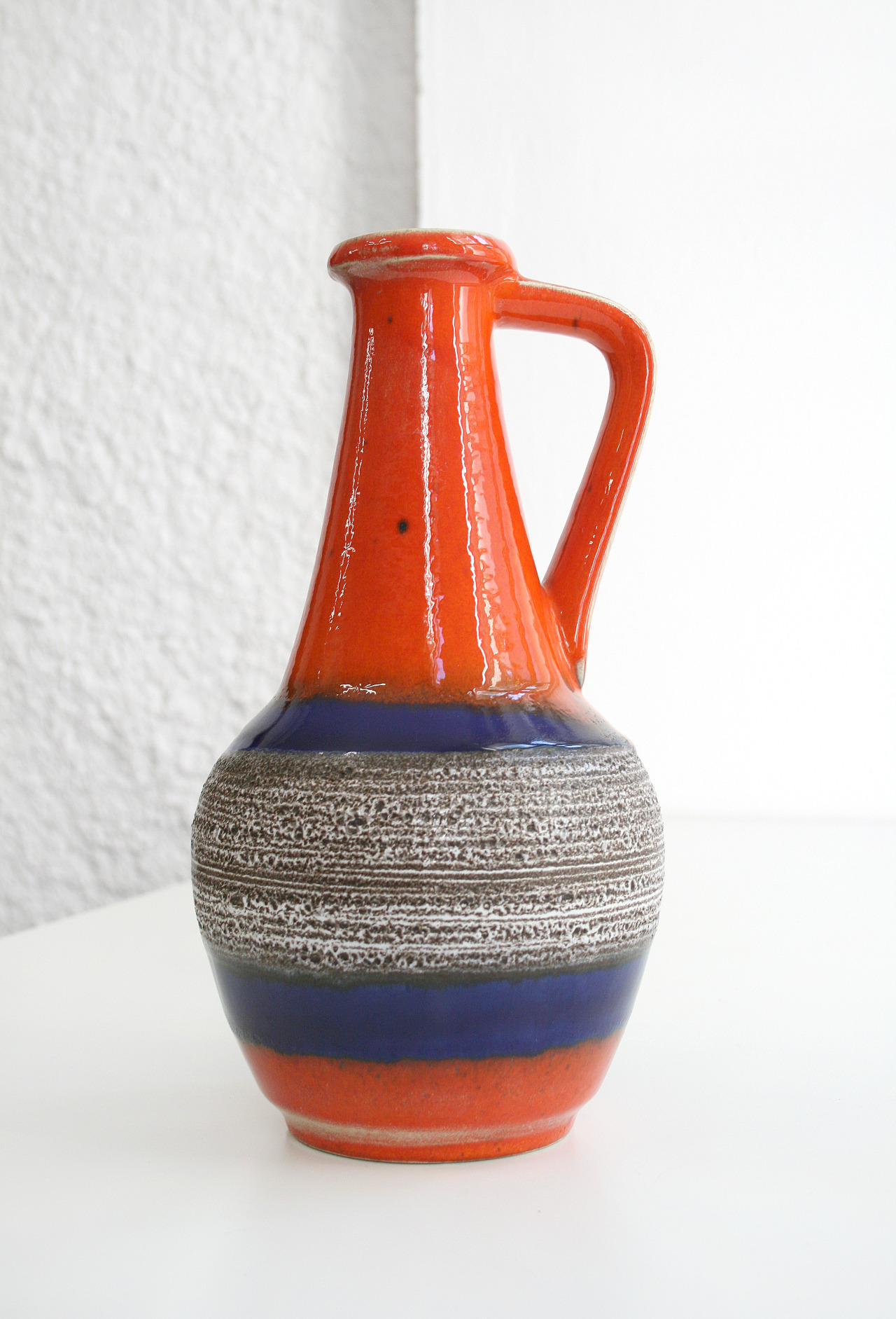Blue and brown fat lava round jug Westest
