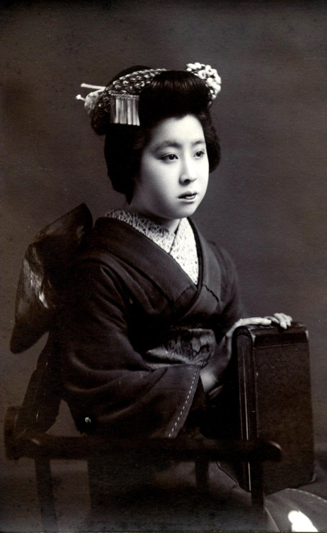 Maiko Kaneko.  1900, Japan.  Kaneko a Maiko (Apprentice Geisha) from Osaka, her name is written in p