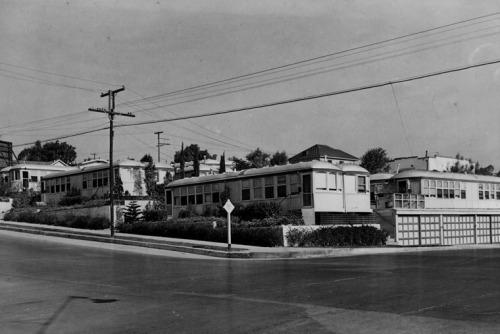  “Bungalow court made up of old street cars; each three-room unit rents for $30 a month.” Los Angele
