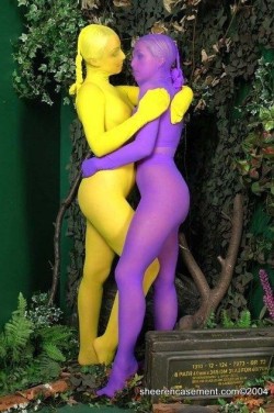 nylonencasementart:  Naughty girls in yellow and purple.