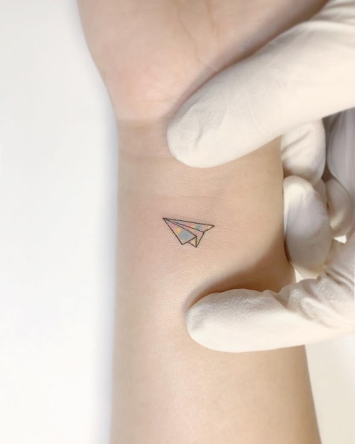 Paper airplane tattoo learn the meaning and find some beautiful ideas