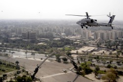 Militaryarmament:  A U.s Army Ah-64 Apache Flying Over The Victory Arch, Baghdad,