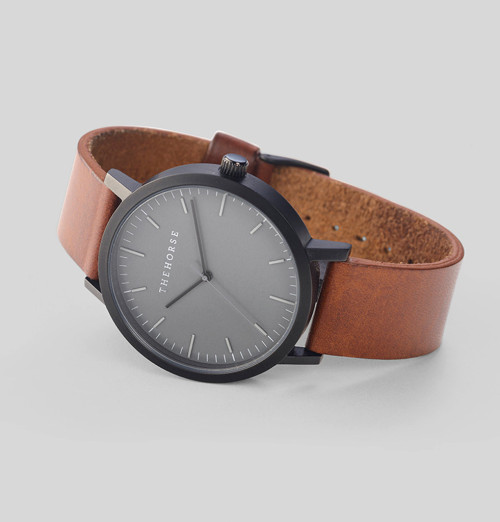 whatisindustrialdesign:  Matte Black & Tan Leather Watch / THEHORSE A simple take on the classic time-teller. Featuring a sandblasted, matte-black stainless steel case, with cool grey face, minimalist markers and premium tan leather band. The Horse