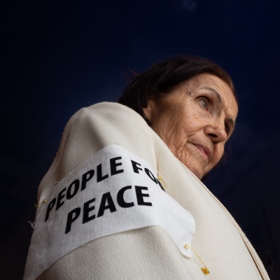 Paulette wearing Good Morning Keith People for Peace patch