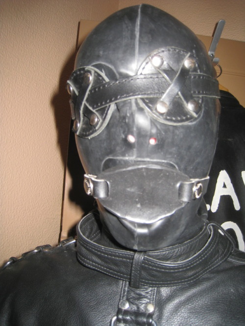 northernleather:A gimp restrained