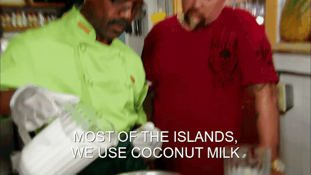 89% sure it's a man standing in a room. Caption: MOST OF THE ISLANDS, WE USE COCONUT MILK