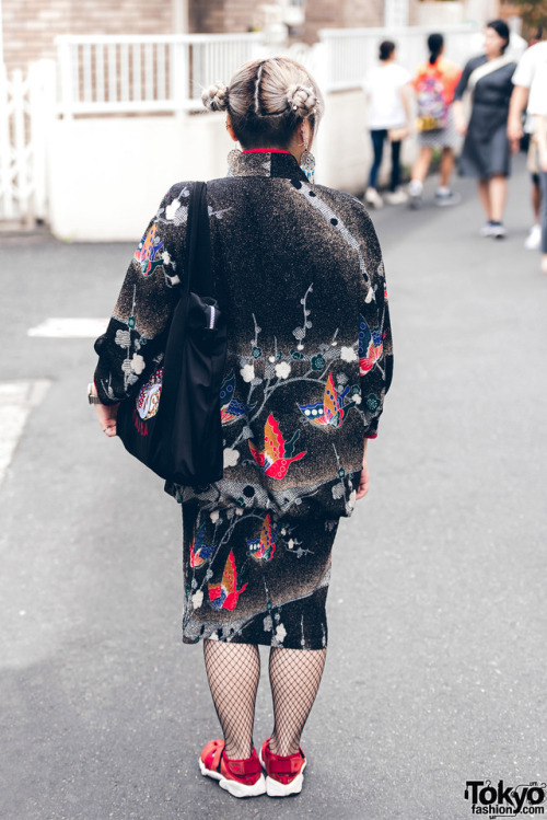 Japanese fashion student Misaki on the street in Harajuku wearing vintage fashion along with split t