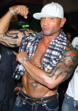 rwfan11:  Batista- showing off his tattoo