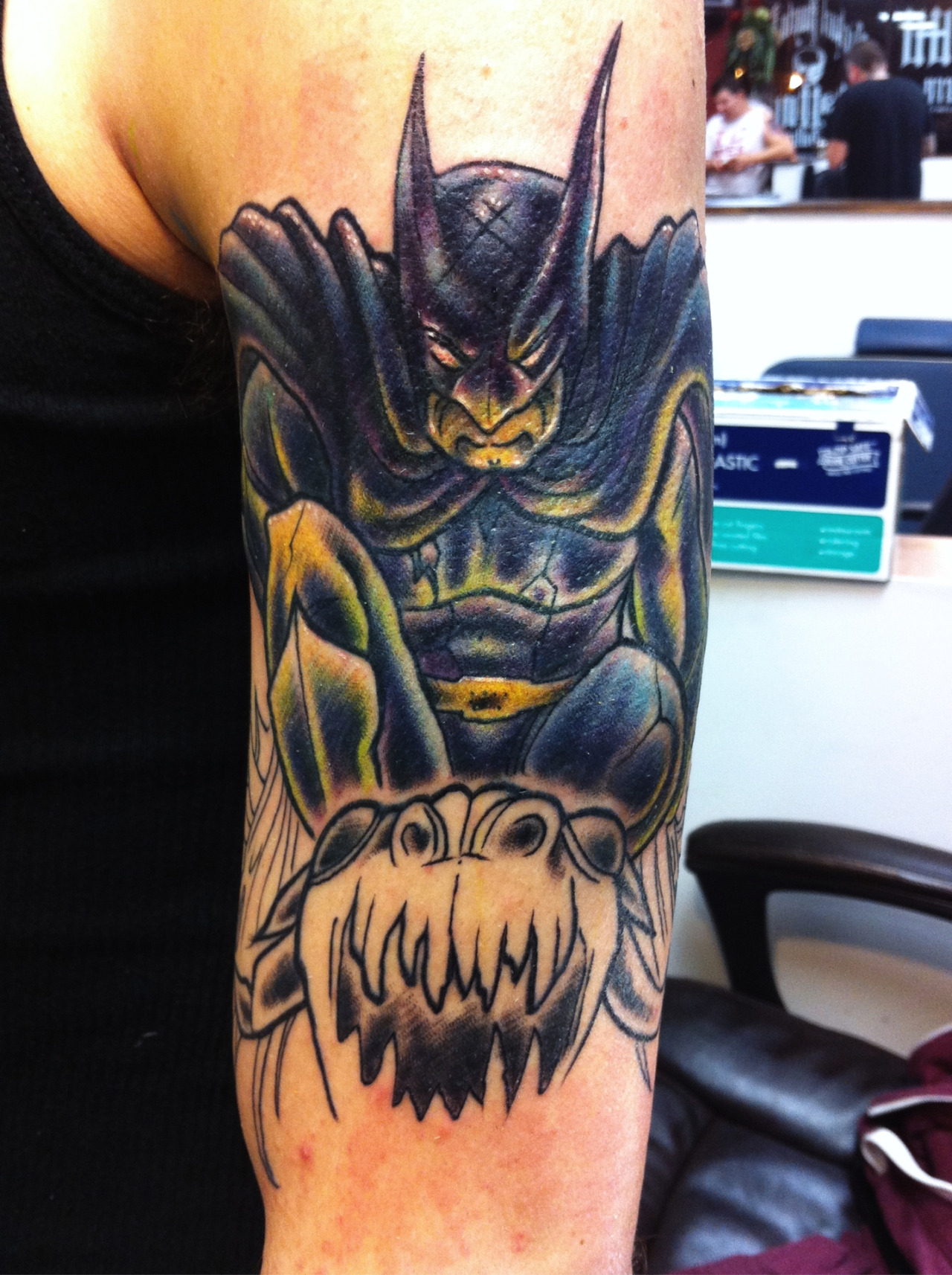 tattoo of Batman and the Joker on a full arm on Craiyon