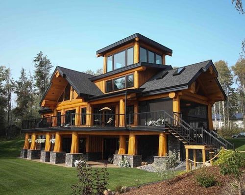 logcabinbureau:  Check out this beautiful post & beam log home from @artisanloghomes. Built using large diameter premium Western Red Cedar, this 6400 sq.ft post and beam log home has it all!  Walk through the custom entry and be greeted by a huge