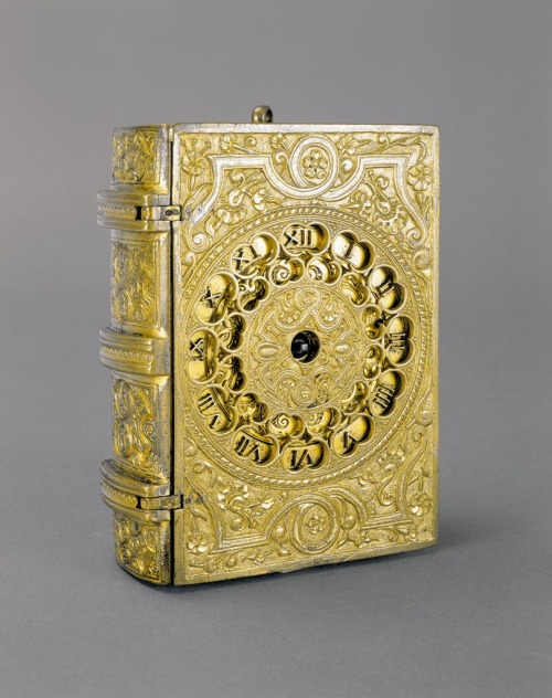 design-is-fine:Travelling clock in the form of a book, 1567. Gilt copper. Made by Martinus Fenich,&n