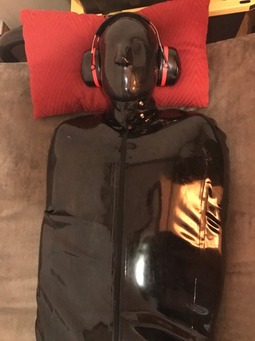 dreadfire:Skoll starting off his weekend of rubber bondage and gimping. First a nap in his sleepsack