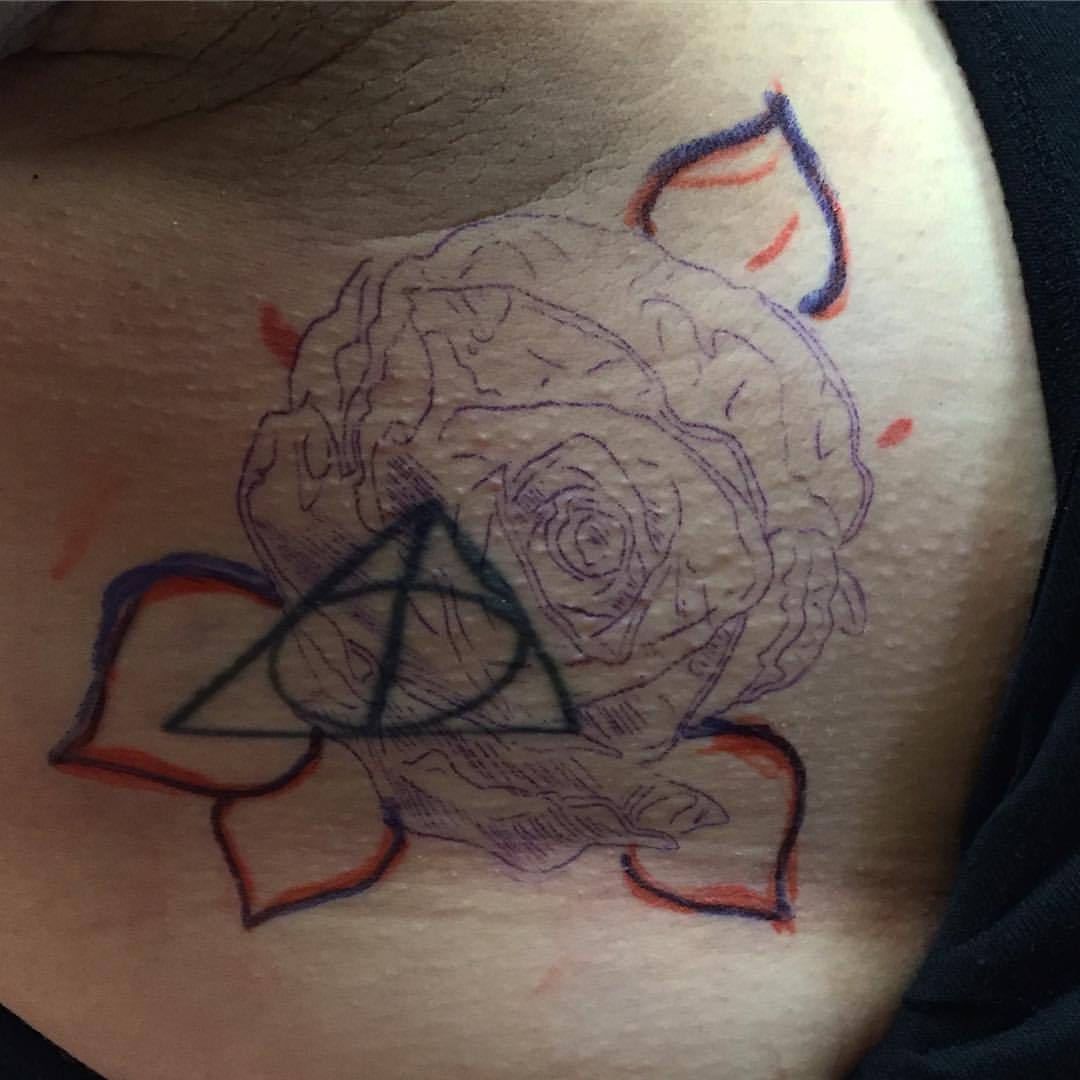 Deathly Hallows tattoo on the thigh  Tattoogridnet