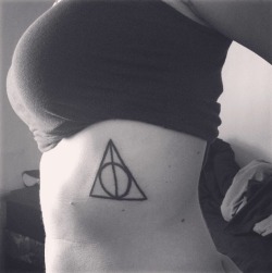 Harry Potter has played such a huge role in my life. It was something my grandmother and I always bonded over. The Deathly Hallows symbol is especially meaningful – for me it has religious denotations (eternal life) and it stands for overcoming...