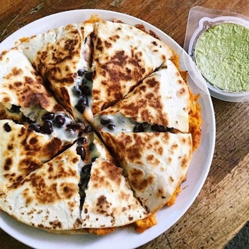 sweeterthanabumblebee: last night!! vegan sweet potato black bean quesadillas using @daiyafoods shre