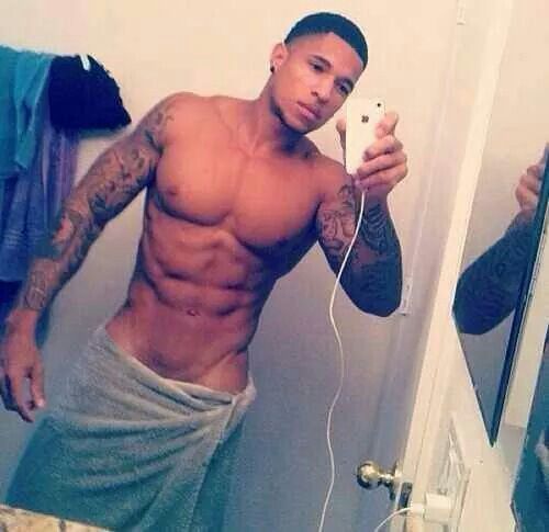 dominicanblackboy:  A sexy gorgeous moment wit hot tatted muscle yummy dick Derek Tramel!😍